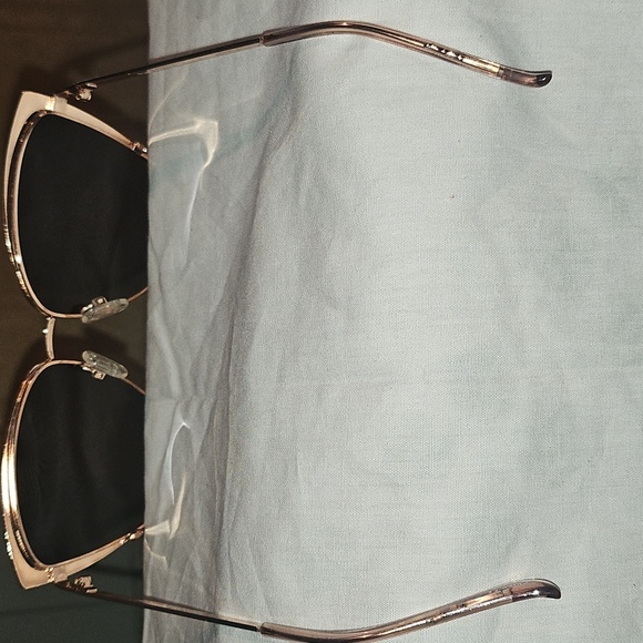 Stylish Pink and Black Sunglasses for a Bold Look - Picture 8 of 16